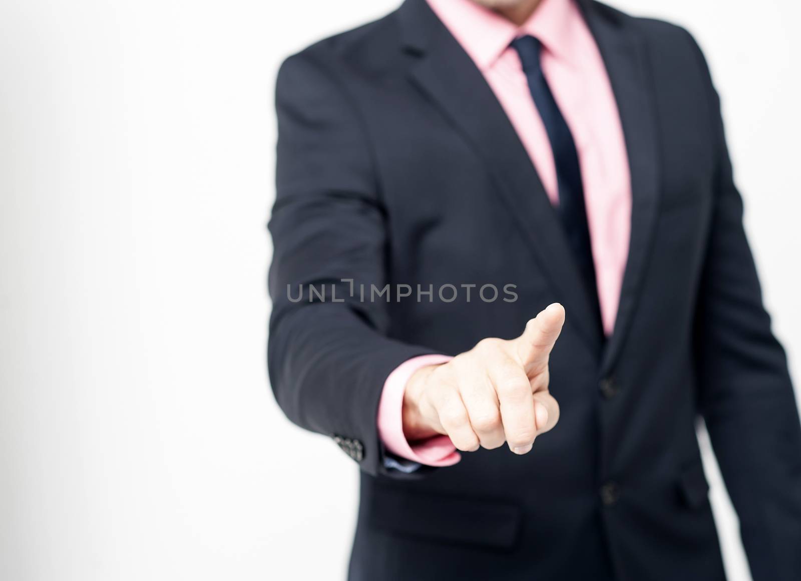 Cropped image of businessman touch virtual button