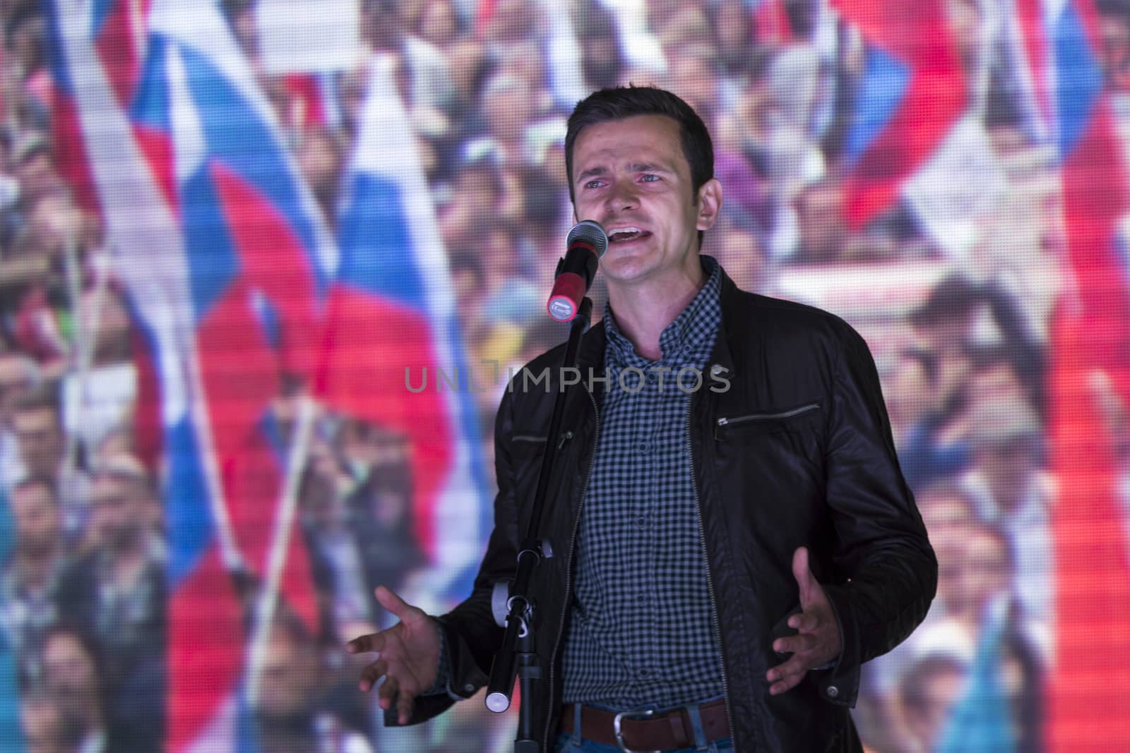 RUSSIA, Moscow: Activist and liberal politician Ilya Yashin addressed Russian opposition activists as they rallied in Moscow on September 20, 2015, in the wake of regional elections that widely favored the ruling United Russia party and prompted accusations of vote rigging. The Meeting to Change Power protest, organised by prominent anti-corruption campaigner Alexei Navalny, drew an estimated 2,000-4,000 people, well short of estimates in advance of the rally. 