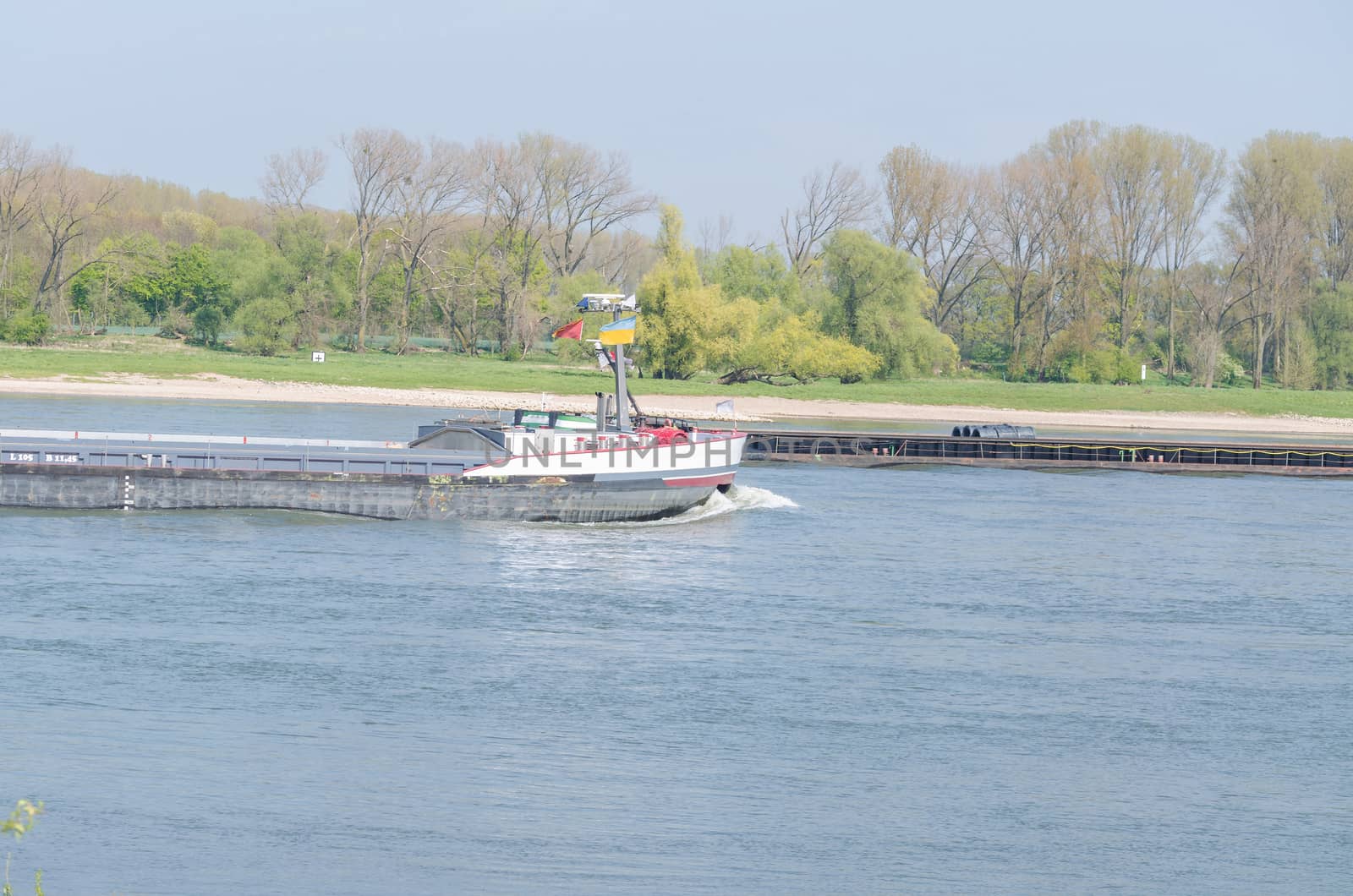Two inland waterway on the Rhine meet.
A ship on uphill drive and the other on plummeting.