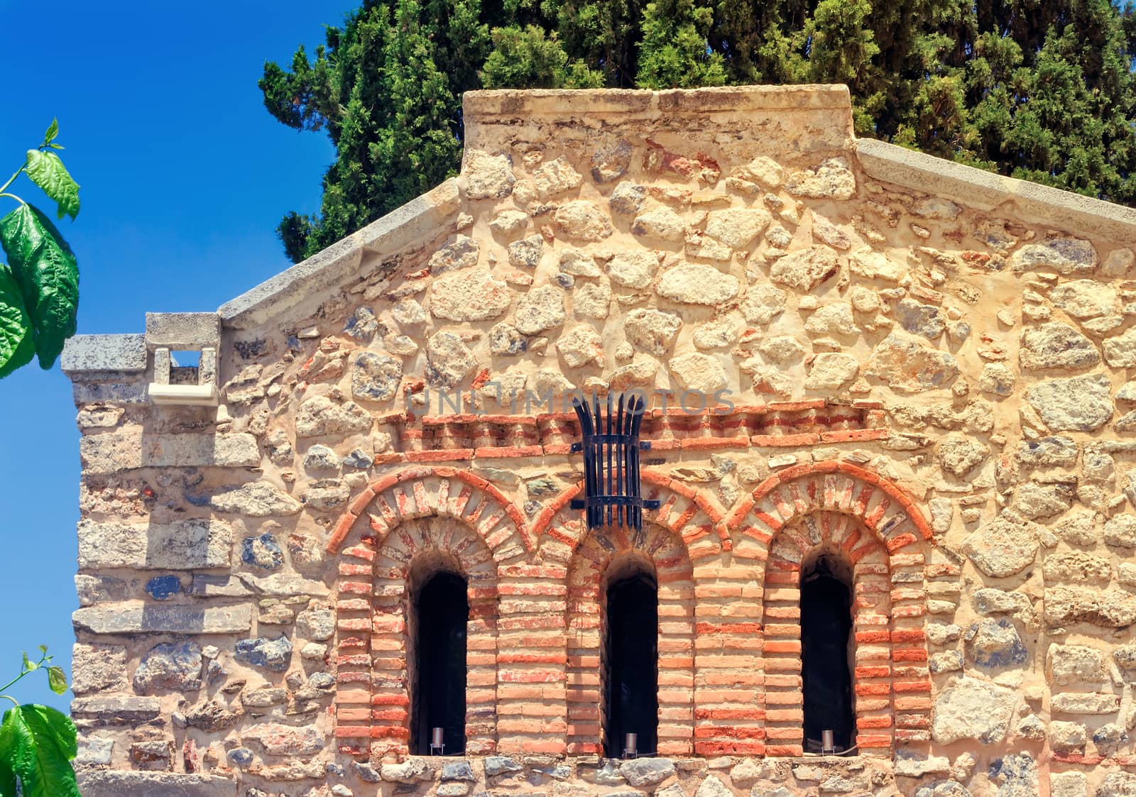 Fragment of the facade of the chapel , Crete, Greece. by georgina198