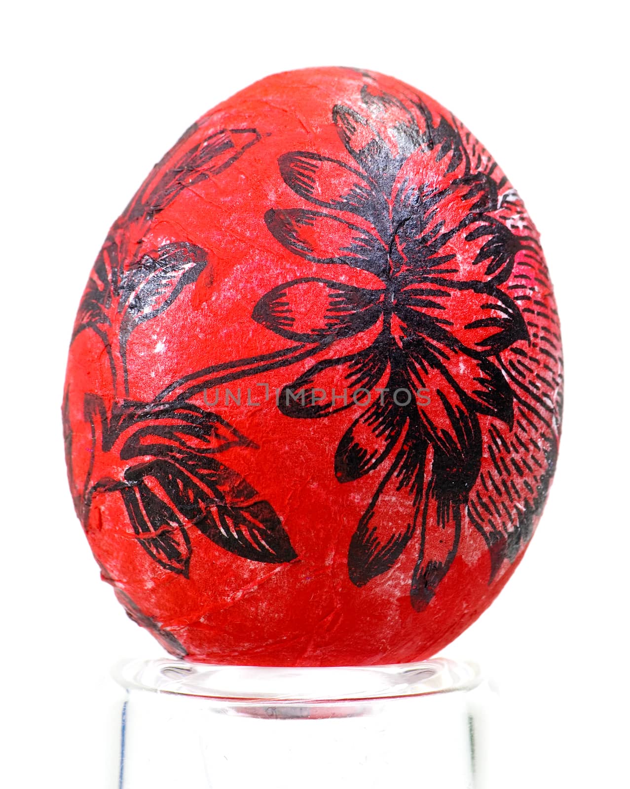 Egg painted by hand in stand isolated on white background by mrakor