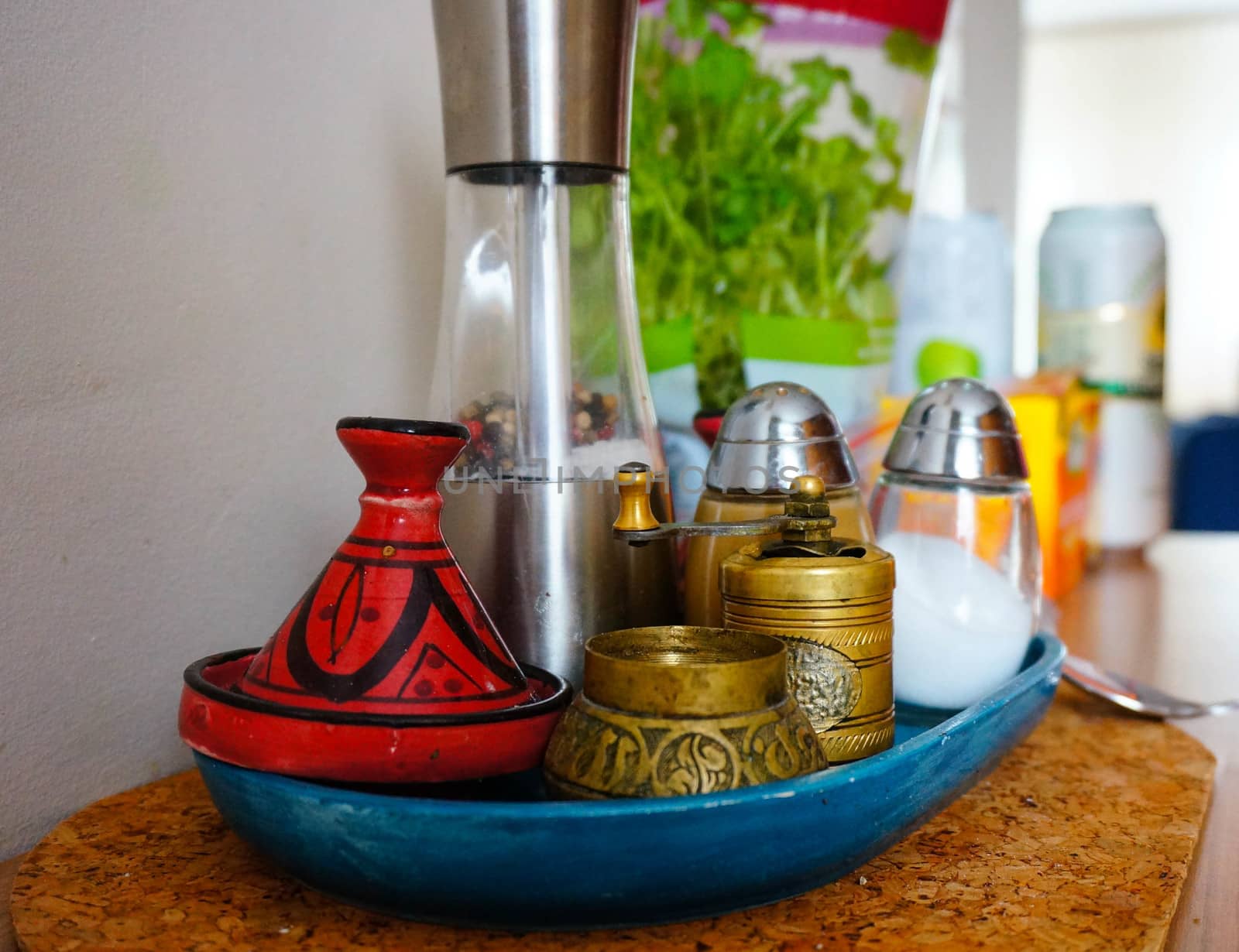 Salt and pepper shakers on table