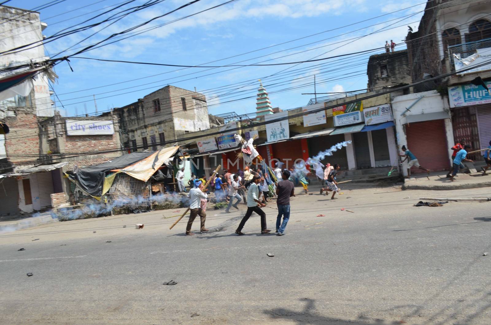 NEPAL, Terai: Nepal announced its first democratic constitution, sparking outrage among the Madeshi and Tharu ethnic communities on September 20, 2015. 	Demonstrators have staged protests in different parts of the Terai region, demanding a new demarcation of the state so that they are more fairly represented under the new constitution. 	The riots became violent and security personnel opened fire on protesters, killing at least one and leaving more than a dozen injured on September 20. 