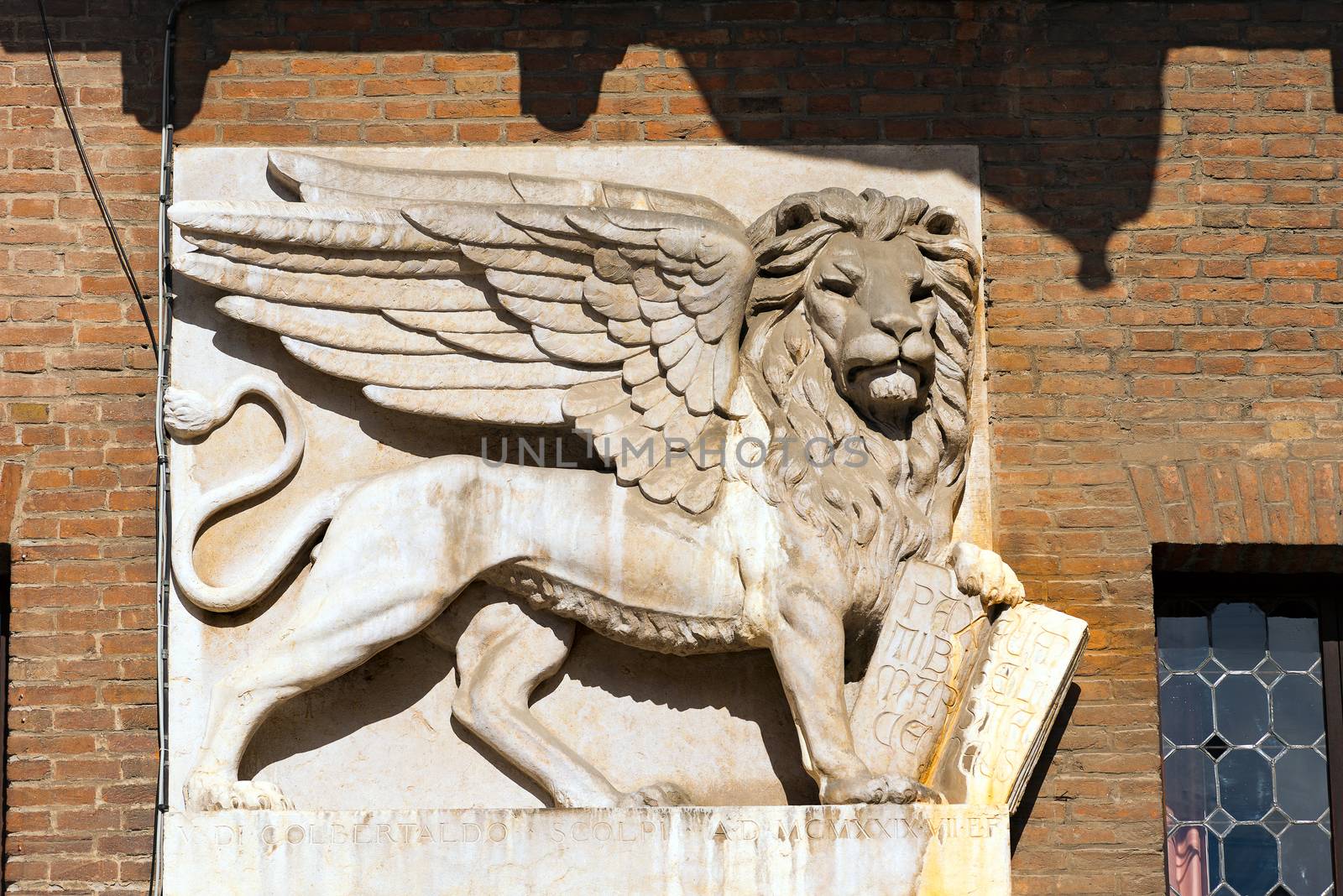 The winged lion of St Mark, symbol of the Venetian Republic, in Piazza dei Signori, Verona (UNESCO world heritage site), Veneto, Italy 