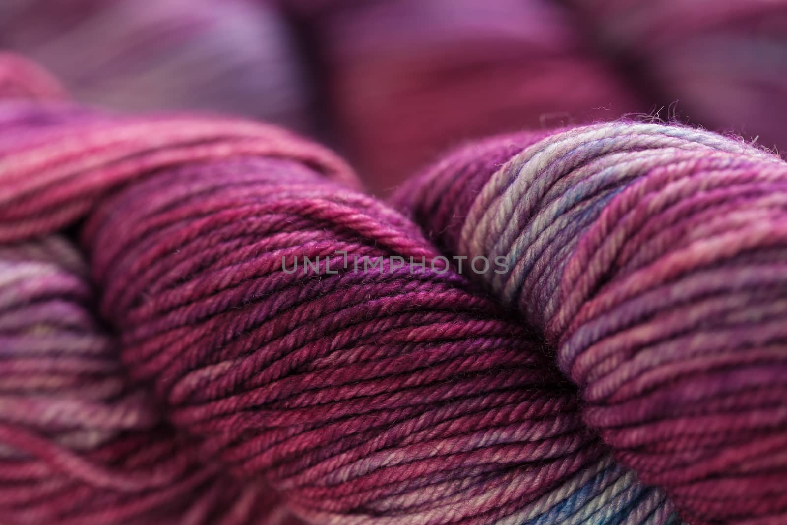 Set of colorful wool yarn balls. Closeup photo.