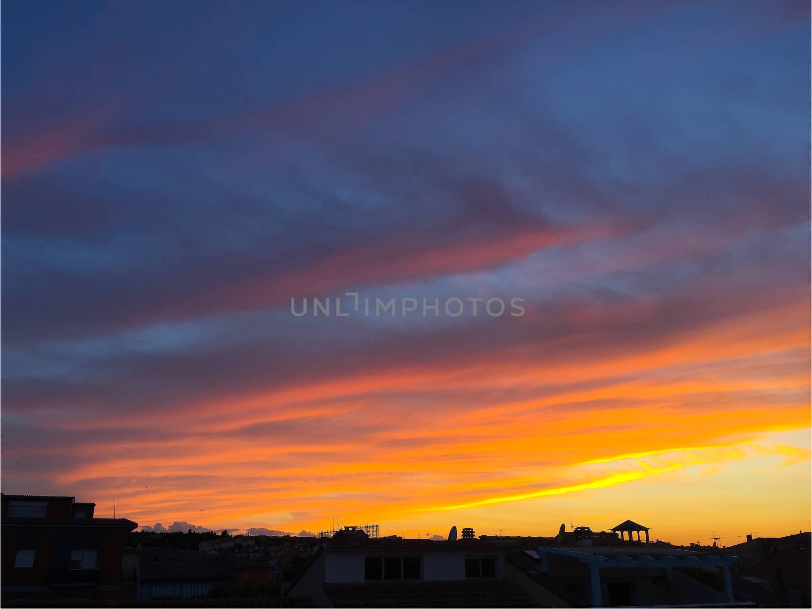 Sunset with warm clouds in the golden hour