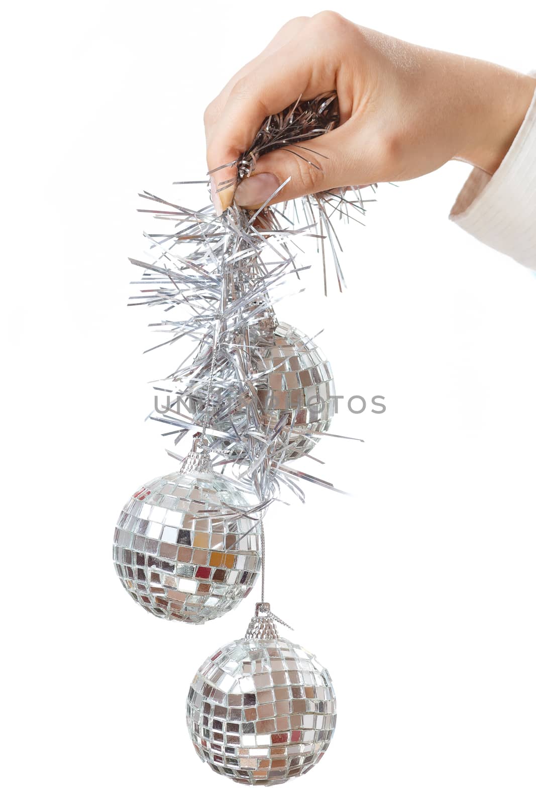 Decorating christmas tree with balls, ribbons and stuff, isolated on white background