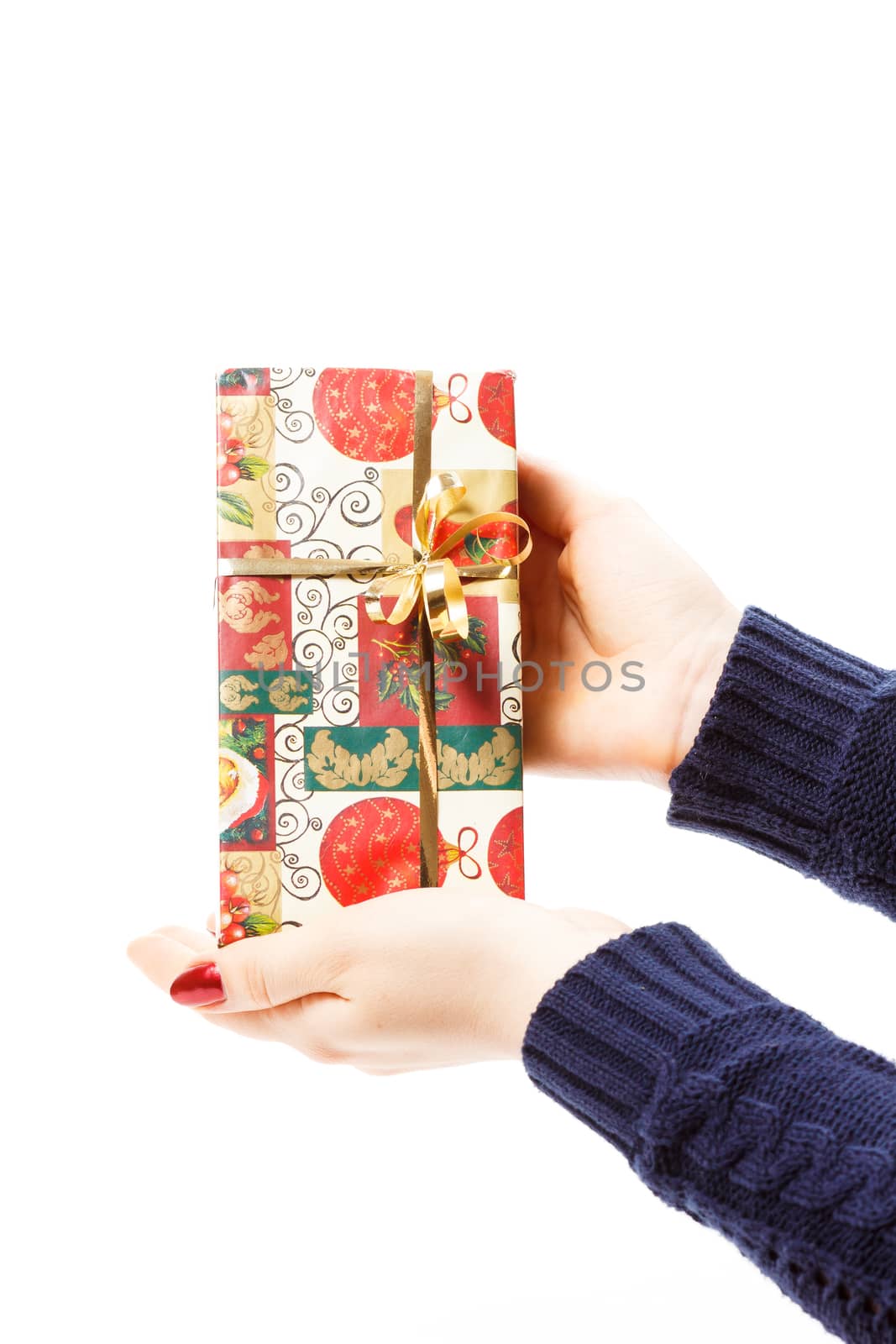 hands with christmas gift isolated on white background