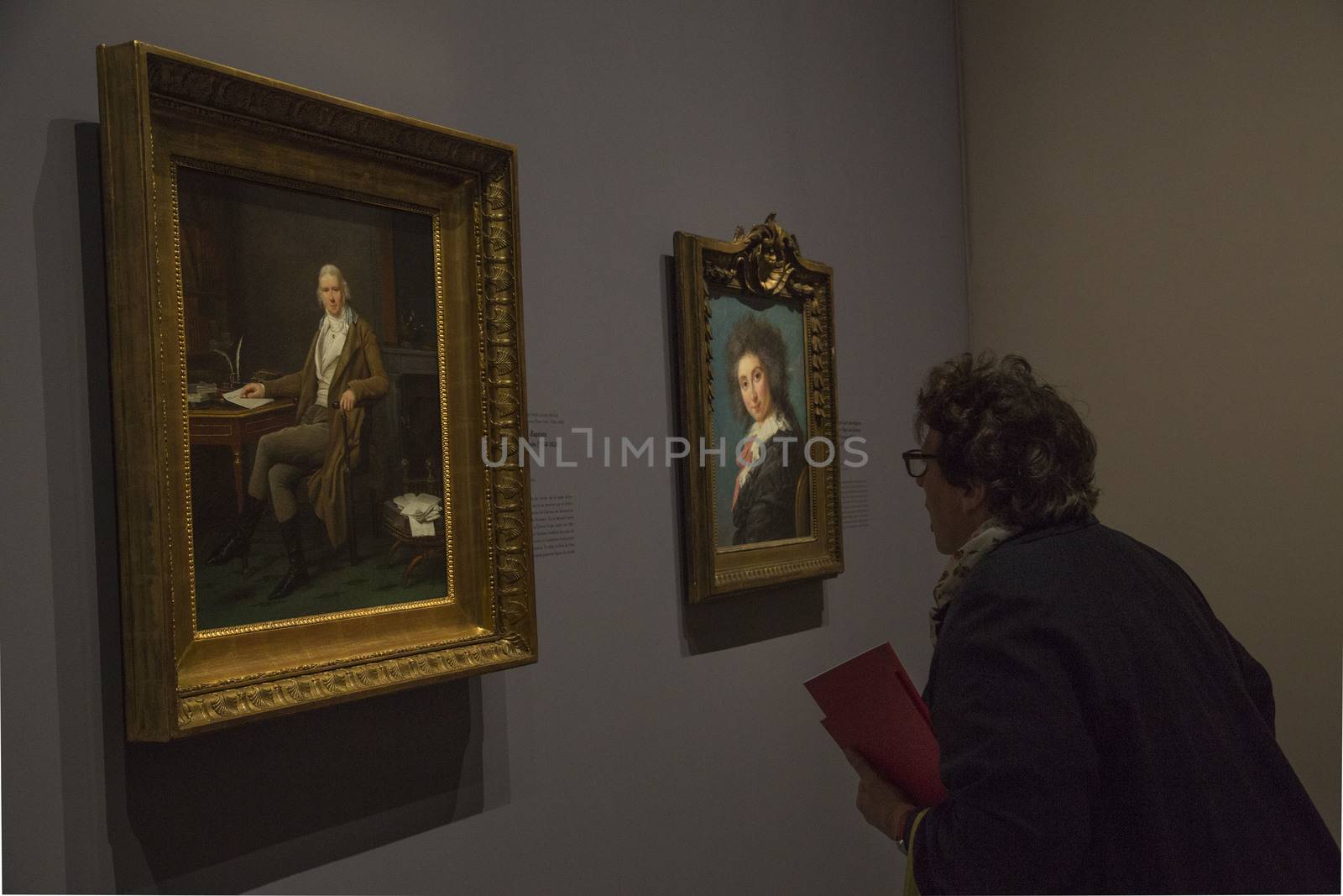 FRANCE, Paris: A man watches two paintings of �lisabeth Louise Vig�e Le Brun in Le Grand Palais, in Paris on September 21, 2015. �lisabeth Louise Vig�e Le Brun (1755-1842) is one of the greater portrait painter of her time. She was chosen to paint the very famous queen of France Marie-Antoinette. 