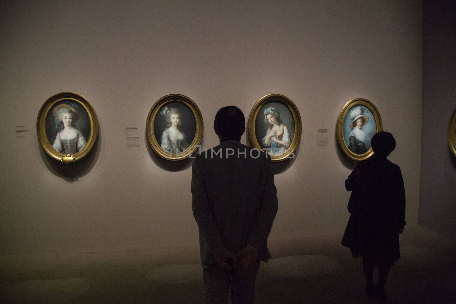 FRANCE, Paris: Some visitors watch a portrait of �lisabeth Louise Vig�e Le Brun in Le Grand Palais, in Paris on September 21, 2015. �lisabeth Louise Vig�e Le Brun (1755-1842) is one of the greater portrait painter of her time. She was chosen to paint the very famous queen of France Marie-Antoinette. 
