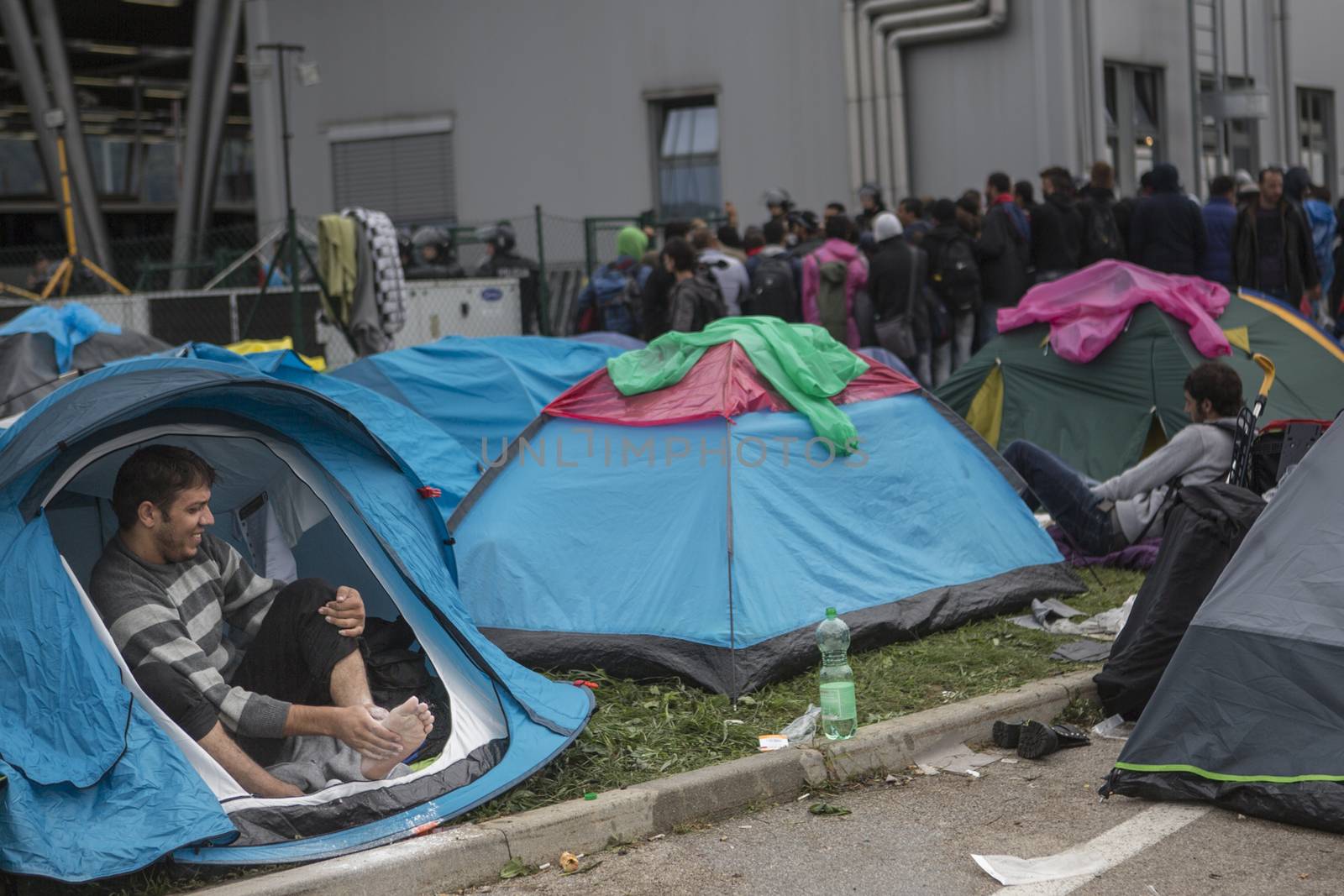 CROATIA, Harmica: Refugees on the border between Croatia and Slovenia find ways to pass the time on September 20, 2015.  Refugees are at the mercy of European authorities as they attempt to escape their war-ravaged countries.