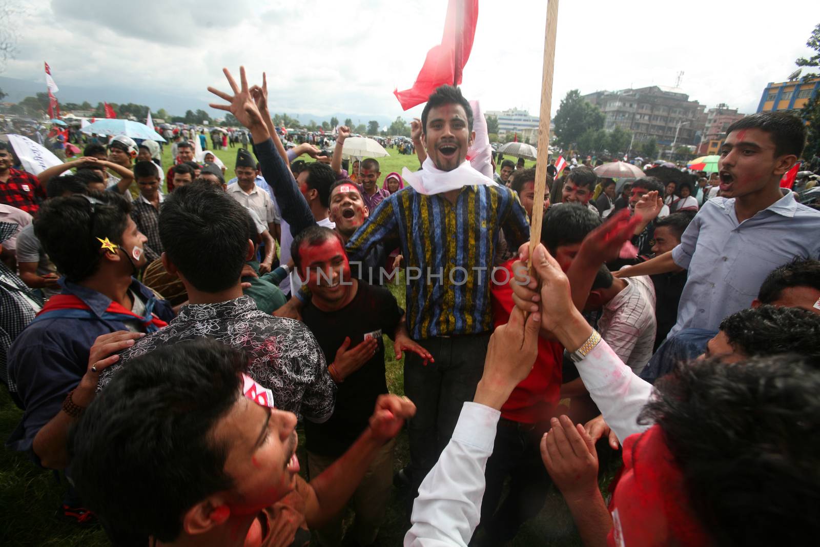 NEPAL, Kathmandu: Celebrations continued in Kathmandu, Nepal on September 21, 2015, one day after the government unveiled the country's first democratic constitution in a historic step. Out of the 598 members of the Constituent Assembly, 507 voted for the new constitution, 25 voted against, and 66 abstained in a vote on September 16, 2015. The event was marked with fireworks and festivities, but also with protests organized by parties of the Tharu and Madhesi ethnic communities.Photos taken by Newzulu contributor Dinesh Shrestha show the Nepalese people donning traditional garb and celebrating with folk music and dancing.