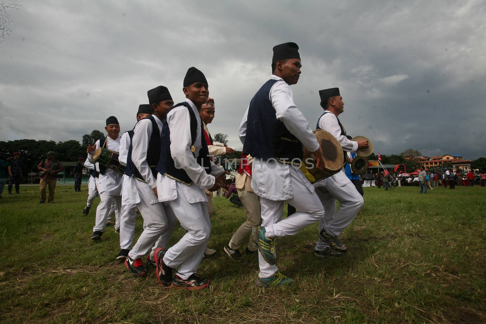 NEPAL, Kathmandu: Performers attend celebrations in Kathmandu, Nepal on September 21, 2015, one day after the government unveiled the country's first democratic constitution in a historic step. Out of the 598 members of the Constituent Assembly, 507 voted for the new constitution, 25 voted against, and 66 abstained in a vote on September 16, 2015. The event was marked with fireworks and festivities, but also with protests organized by parties of the Tharu and Madhesi ethnic communities.Photos taken by Newzulu contributor Dinesh Shrestha show the Nepalese people donning traditional garb and celebrating with folk music and dancing.