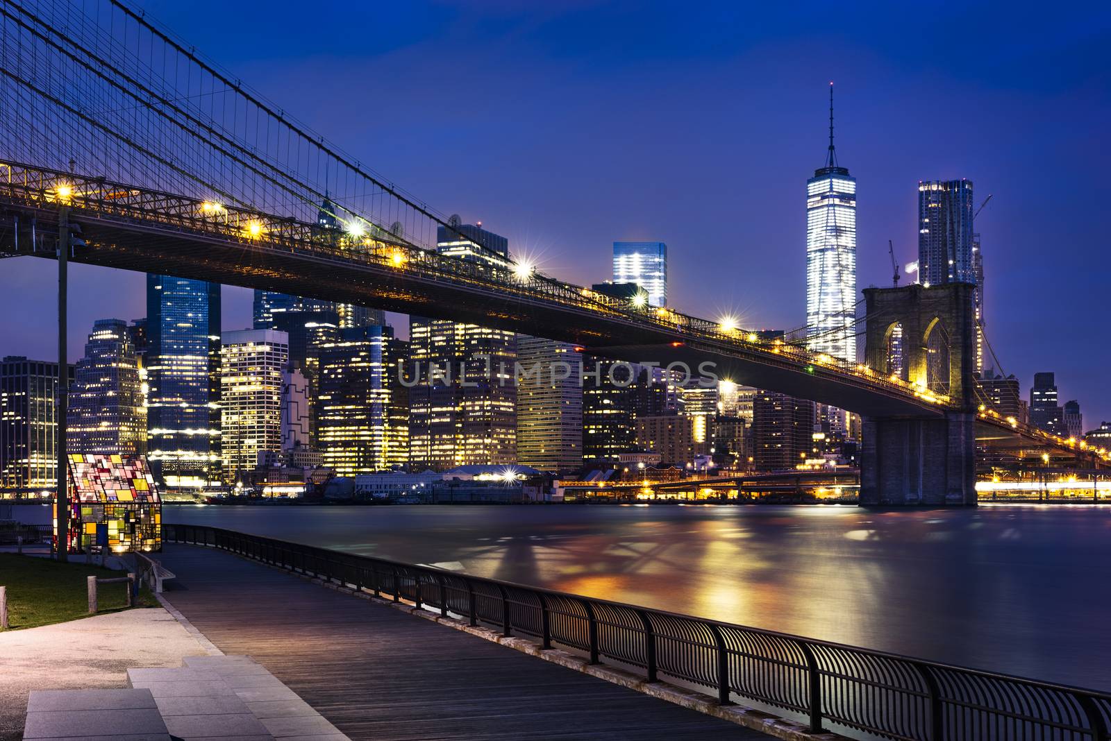 New York City - beautiful sunrise over manhattan with manhattan and brooklyn bridge USA