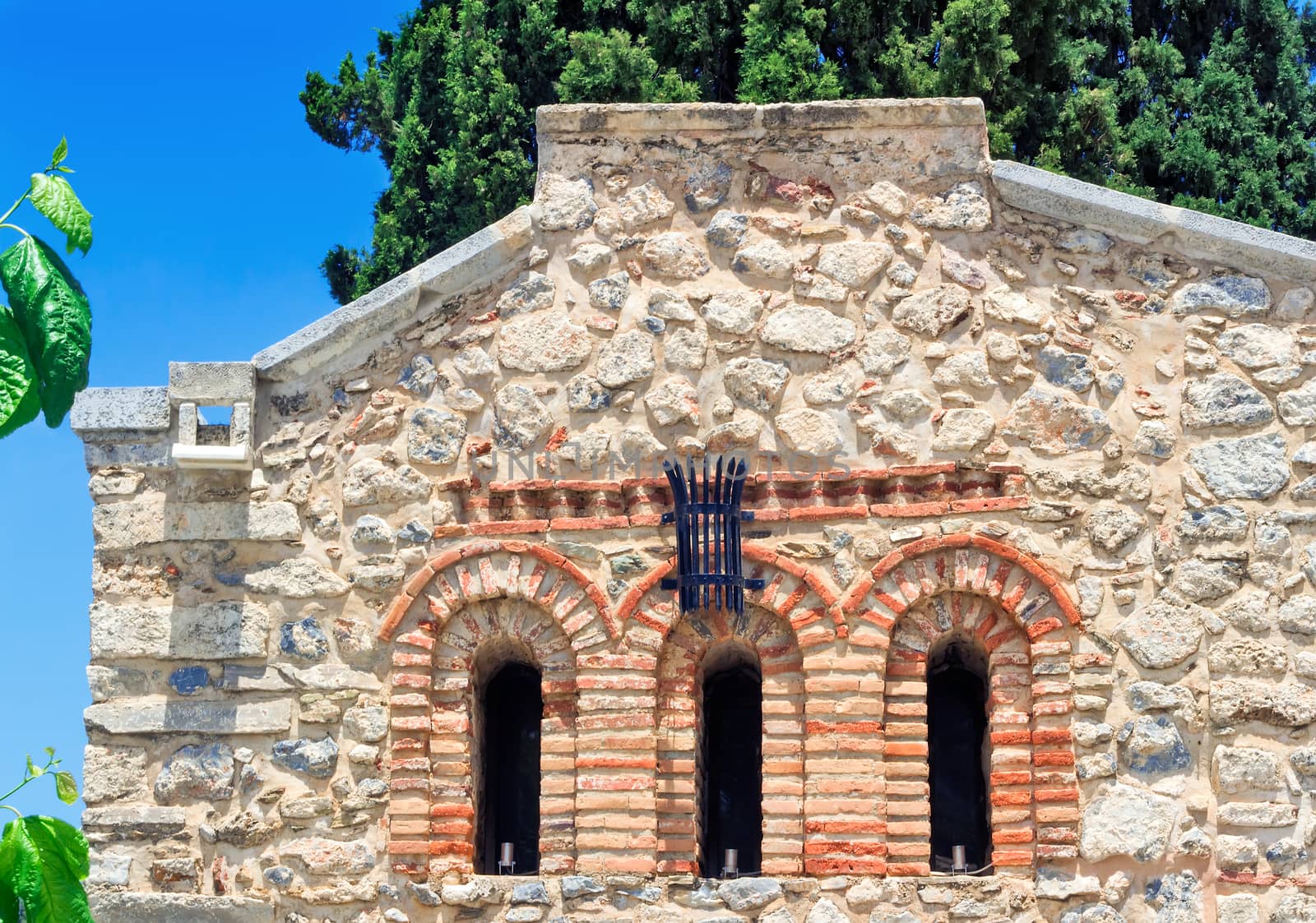 Fragment of the facade of the chapel , Crete, Greece. by georgina198