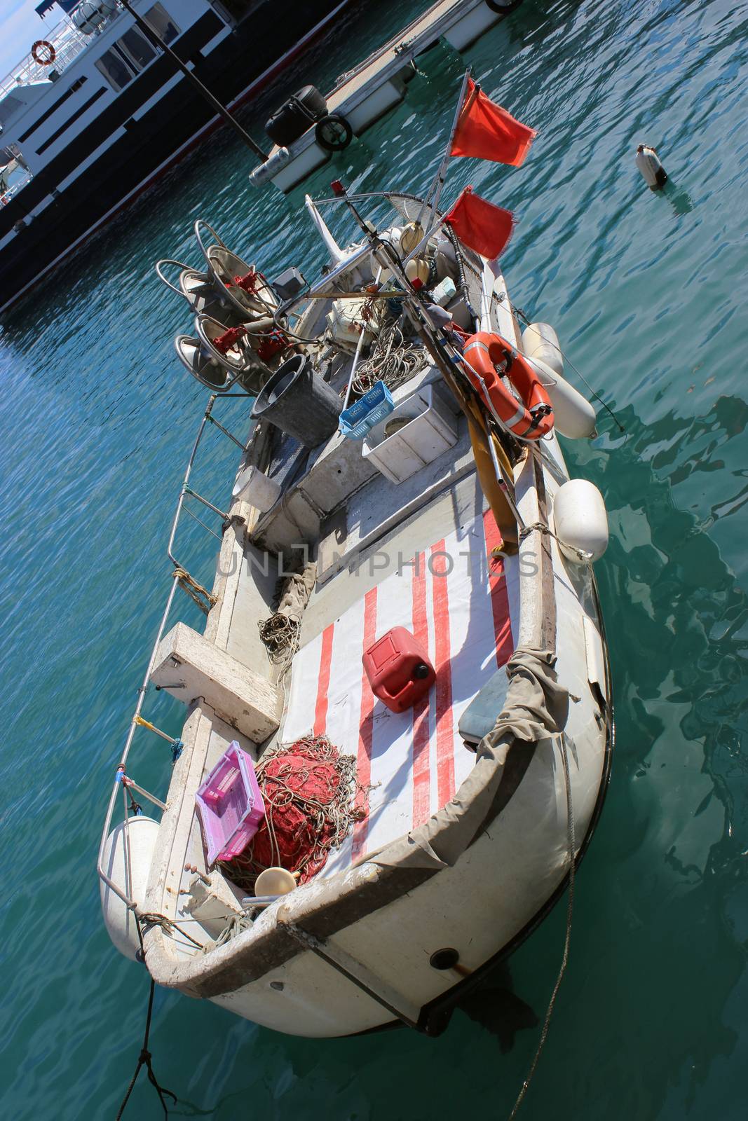 Wooden boat in the port of Nice