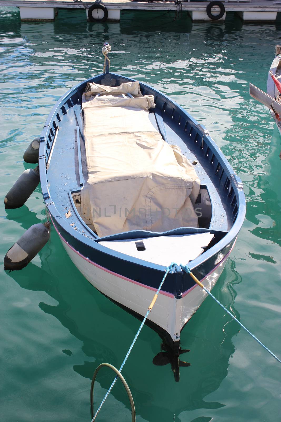 Wooden fishing boat in the port of Nice