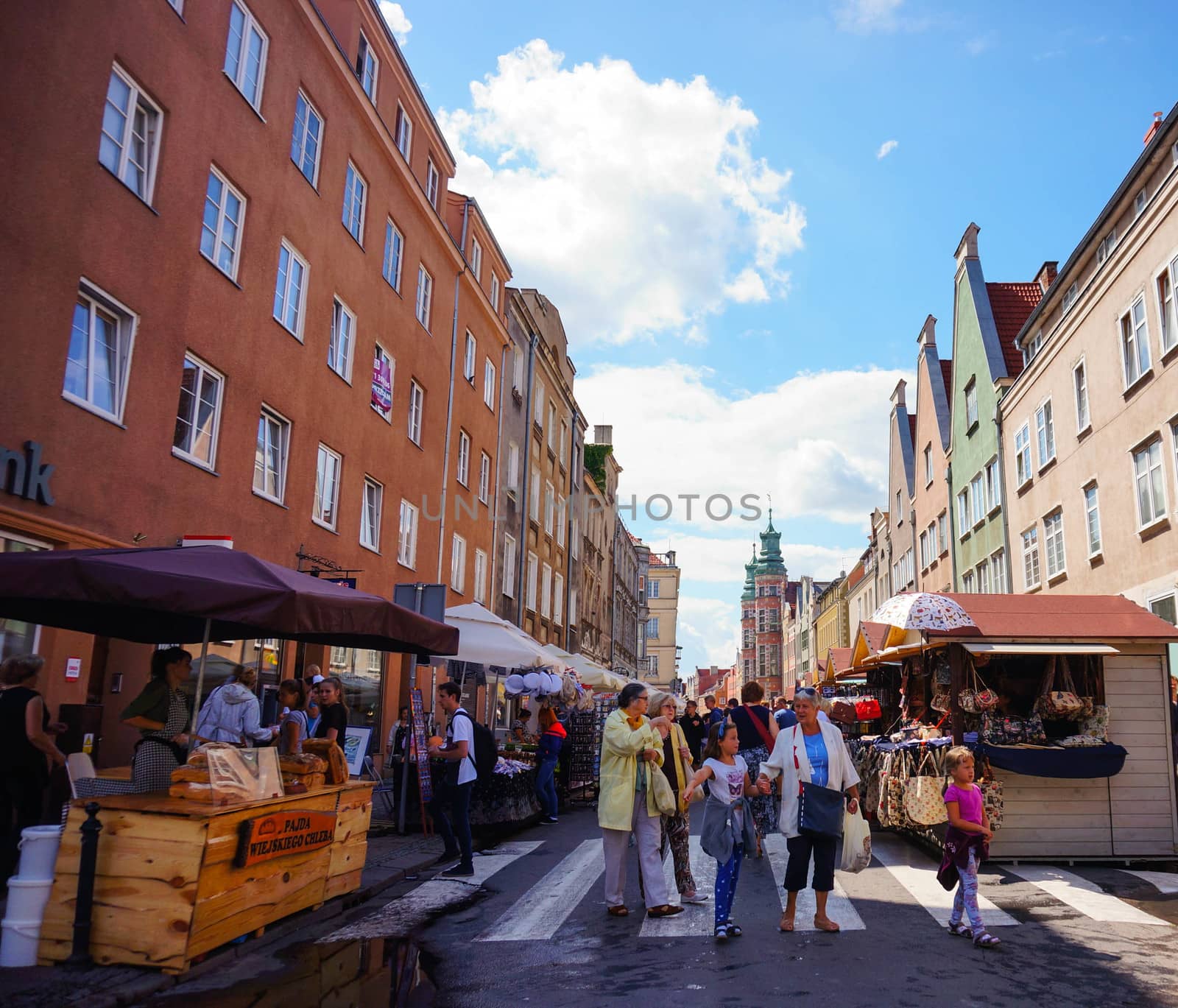 GDANSK, POLAND - JULY 29, 2015: People walking on the street at a traditional yearly market in the city center