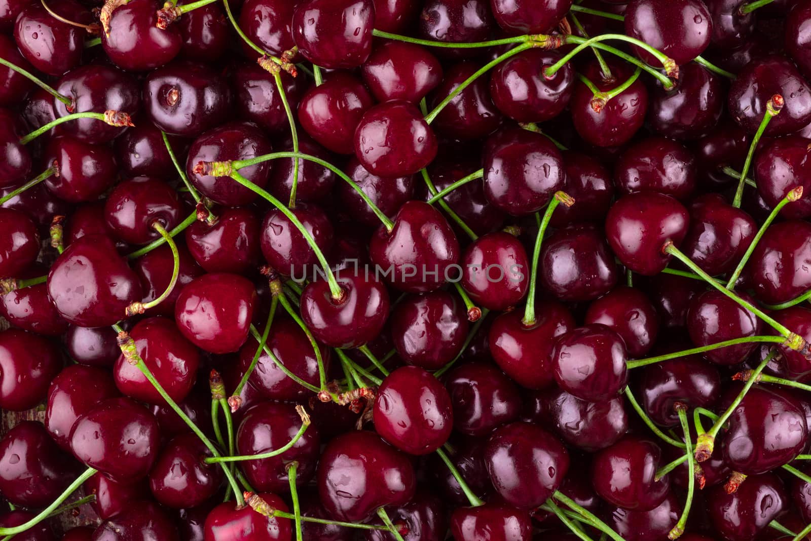 ripe sweet raw tasty cherry as background