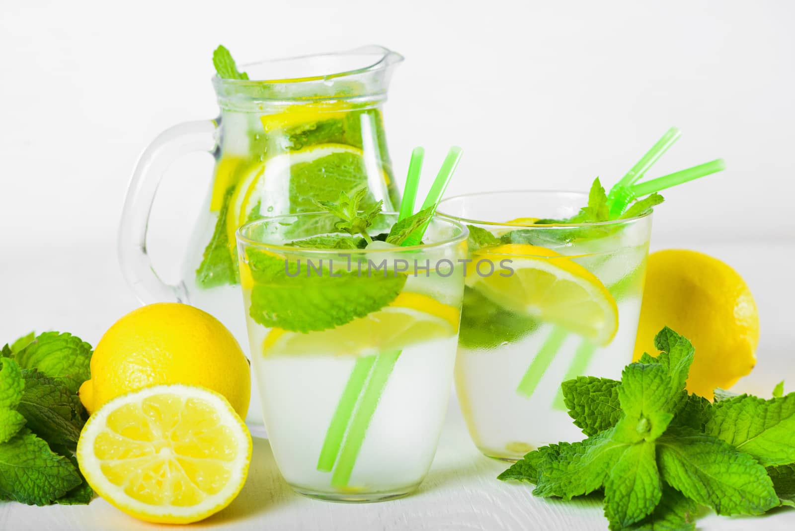 Delicious refreshing lemonade with fresh mint, Lemon, honey and ice. Healthy summer drink.