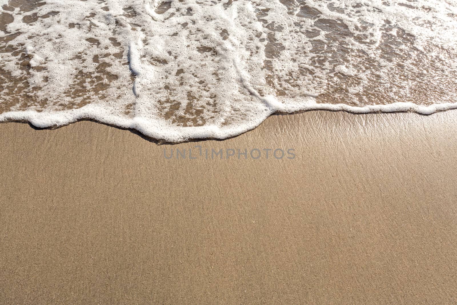 Tropical beach wave close with space for text, Bali, Indonesia
