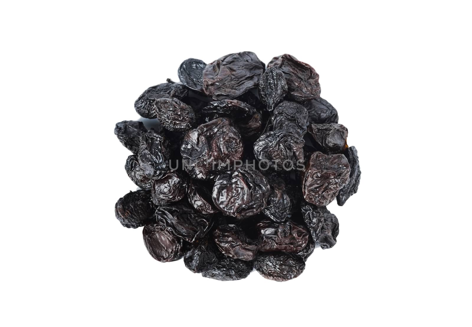 Dried prunes on a white background, top view by iprachenko