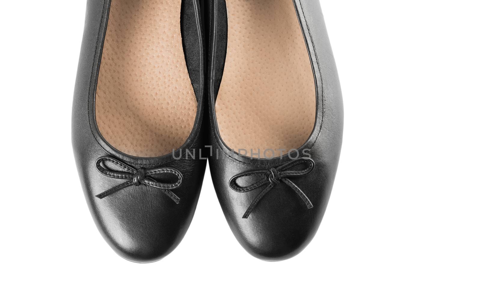 Black classic shoes on a white background, top view