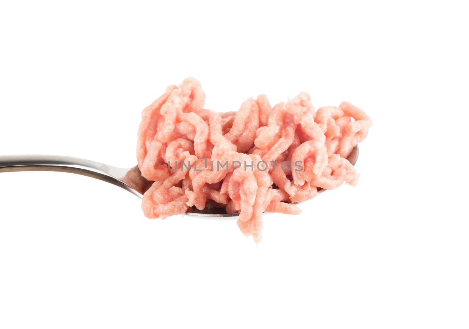 minced pork in iron spoon on a white background isolated, ingredient for burgers, cutlets cooking 