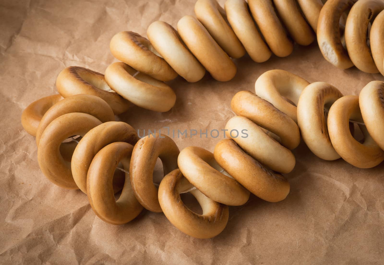 bunch of delicious fresh bagels on a sheet of paper