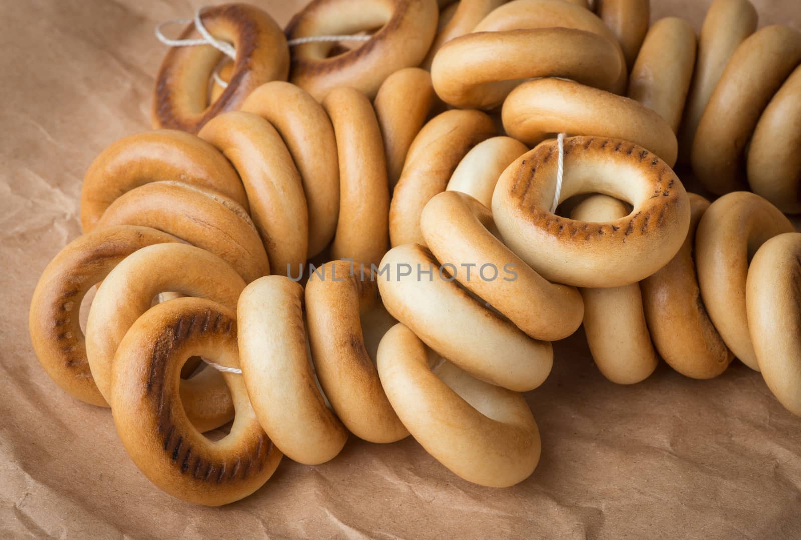 bunch of delicious fresh bagels on a sheet of paper