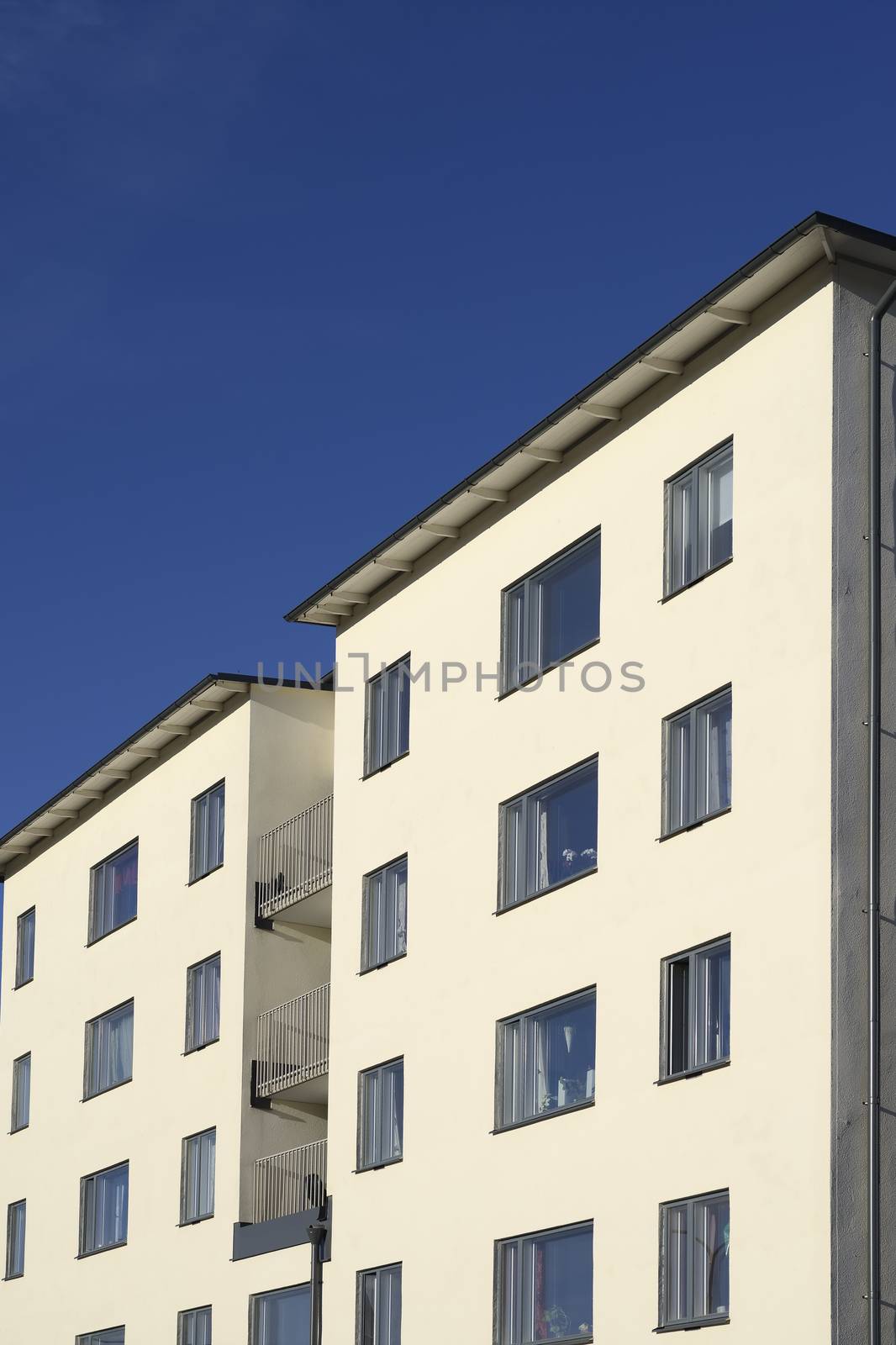 Detail of a modern building with blue sky.