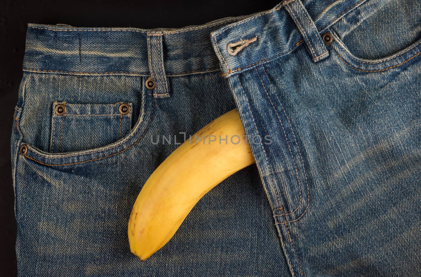 Big Banana and men's jeans, like the penis, top view