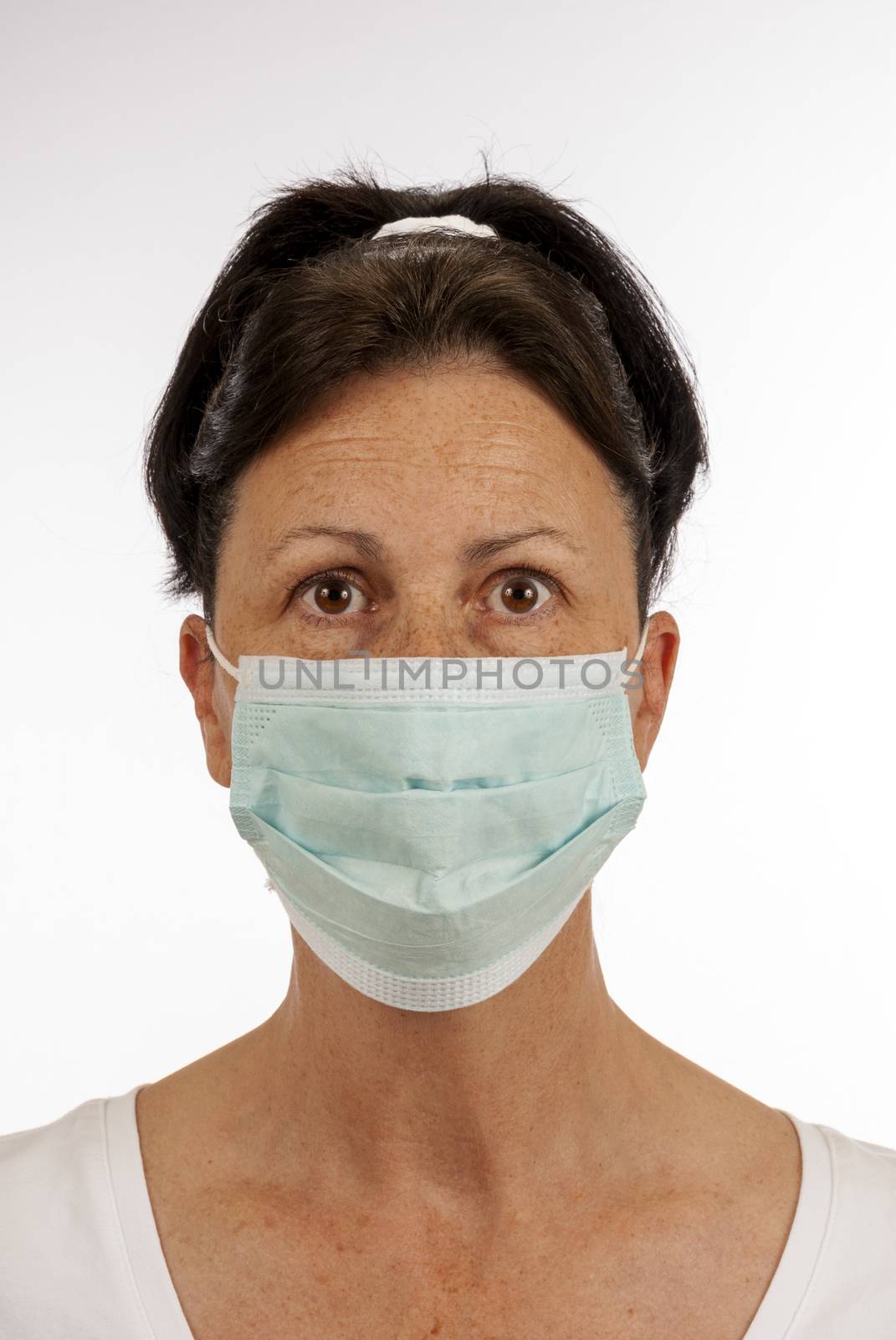 Vertical shot of woman wearing protective mask for fear of catching a bug.