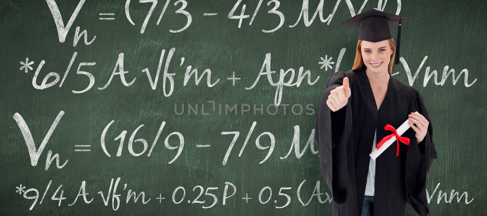 Teenage Girl Celebrating Graduation with thumbs up against green chalkboard