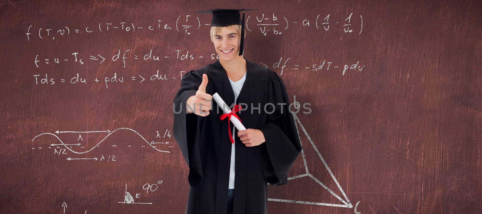 Happy Teen Guy Celebrating Graduation against desk