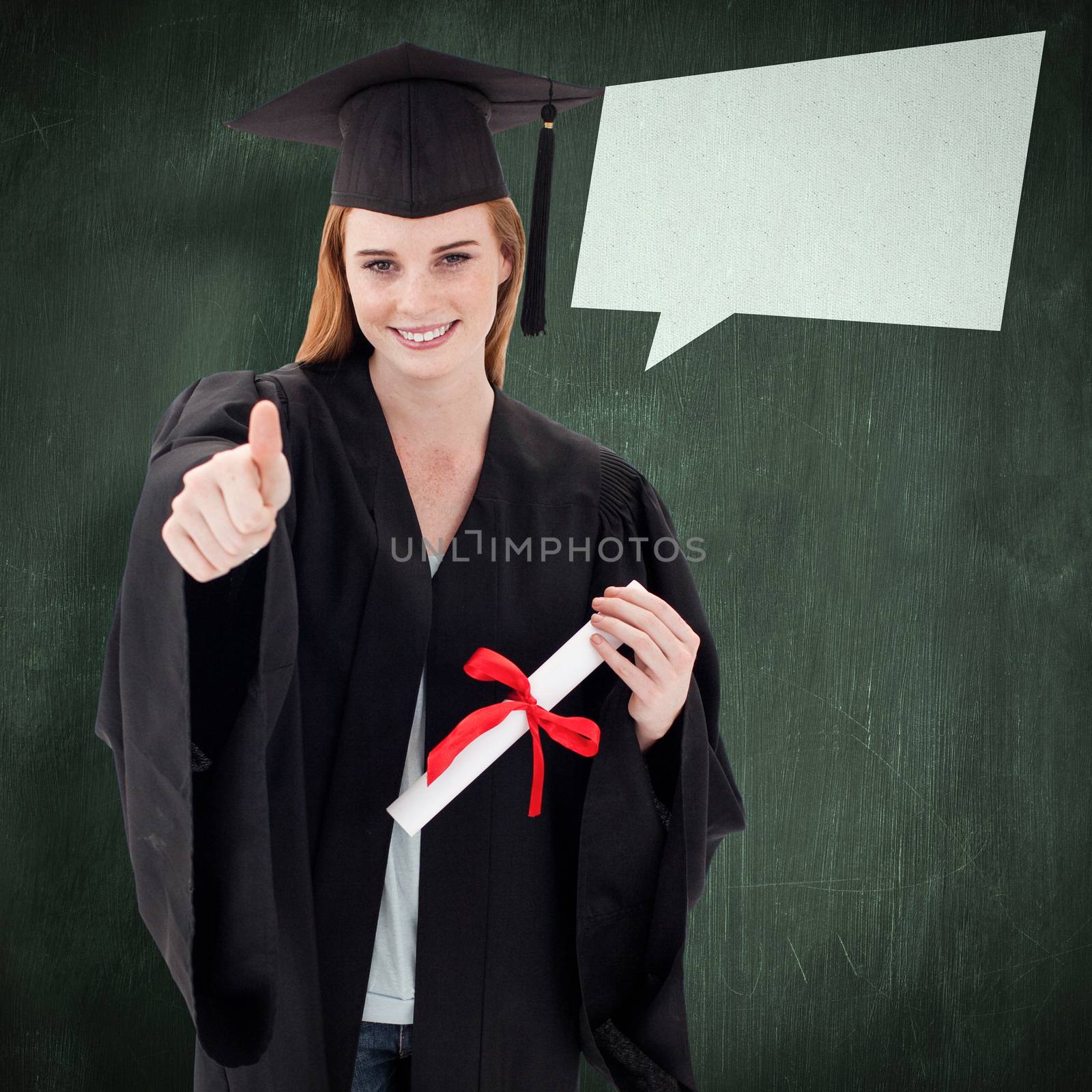 Teenage Girl Celebrating Graduation with thumbs up against green chalkboard