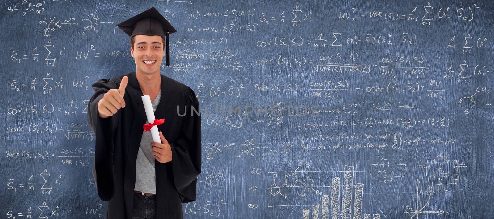 Happy Teen Guy Celebrating Graduation against blue chalkboard