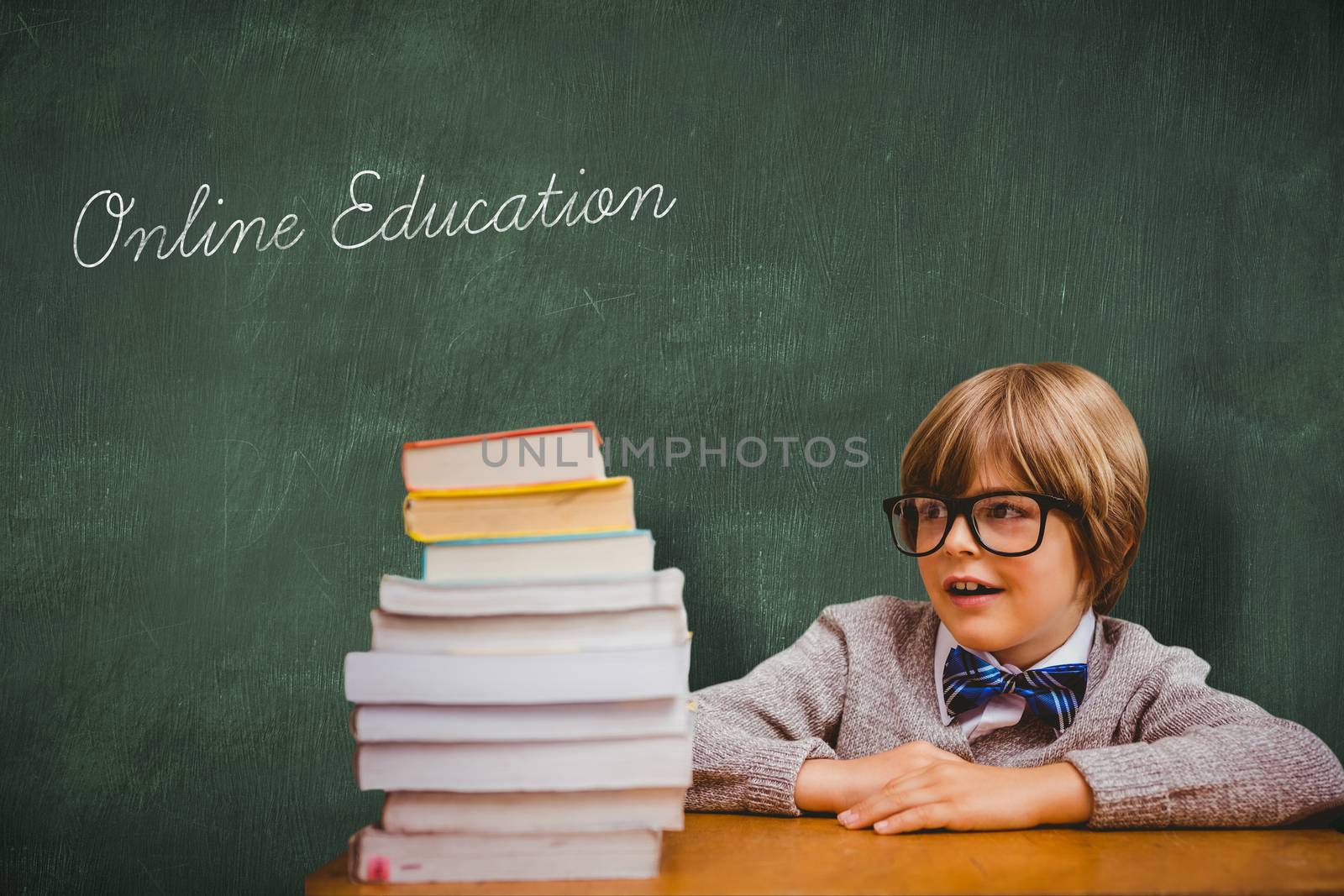 Online education against green chalkboard by Wavebreakmedia