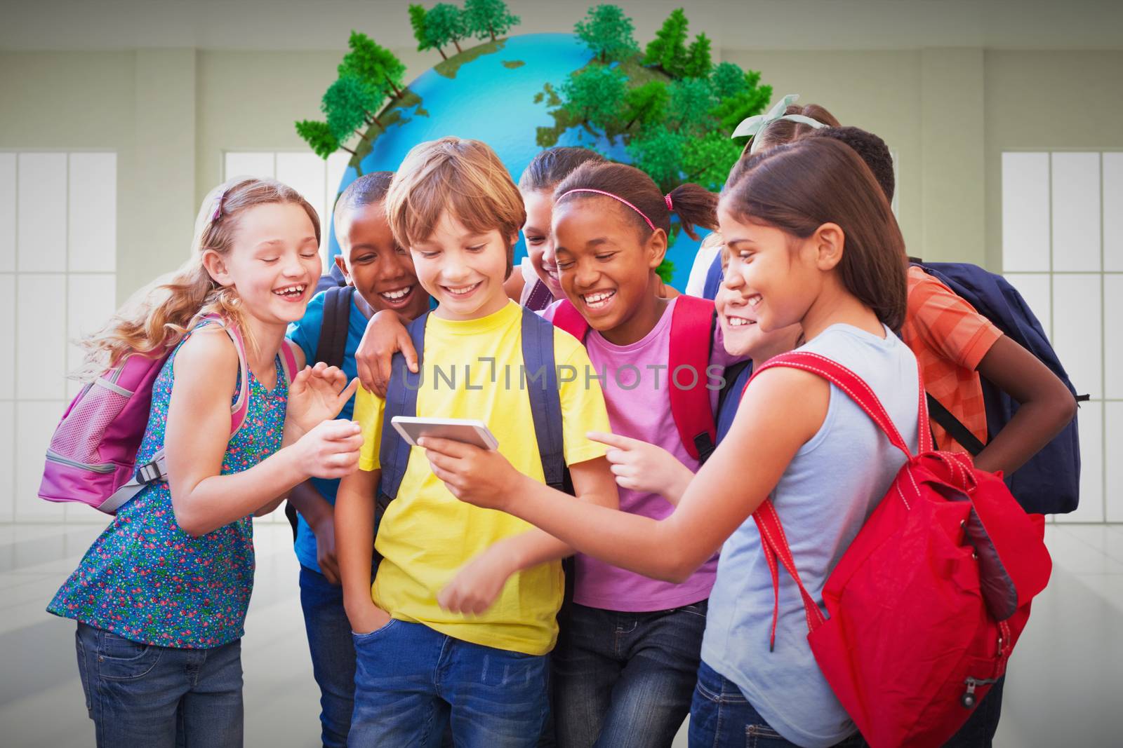 Cute pupils using mobile phone  against earth floating in room