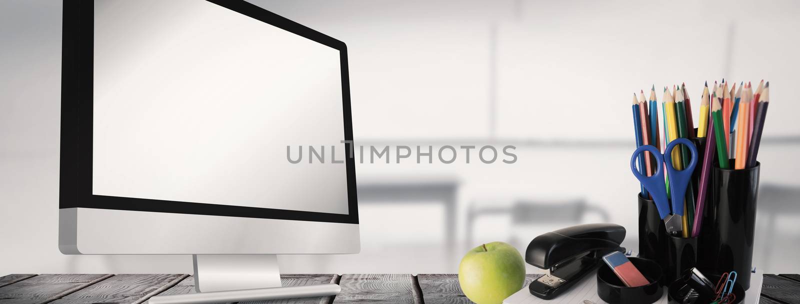 Composite image of school supplies on desk by Wavebreakmedia