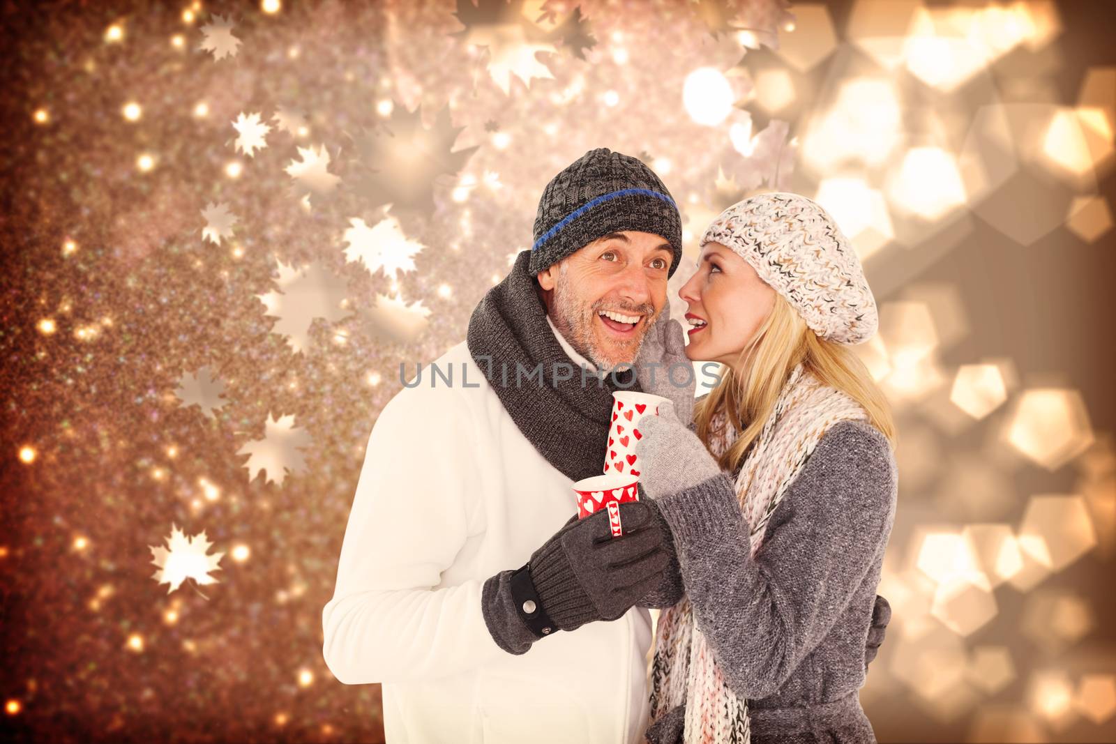 Composite image of happy couple gossiping while drinking hot tea by Wavebreakmedia