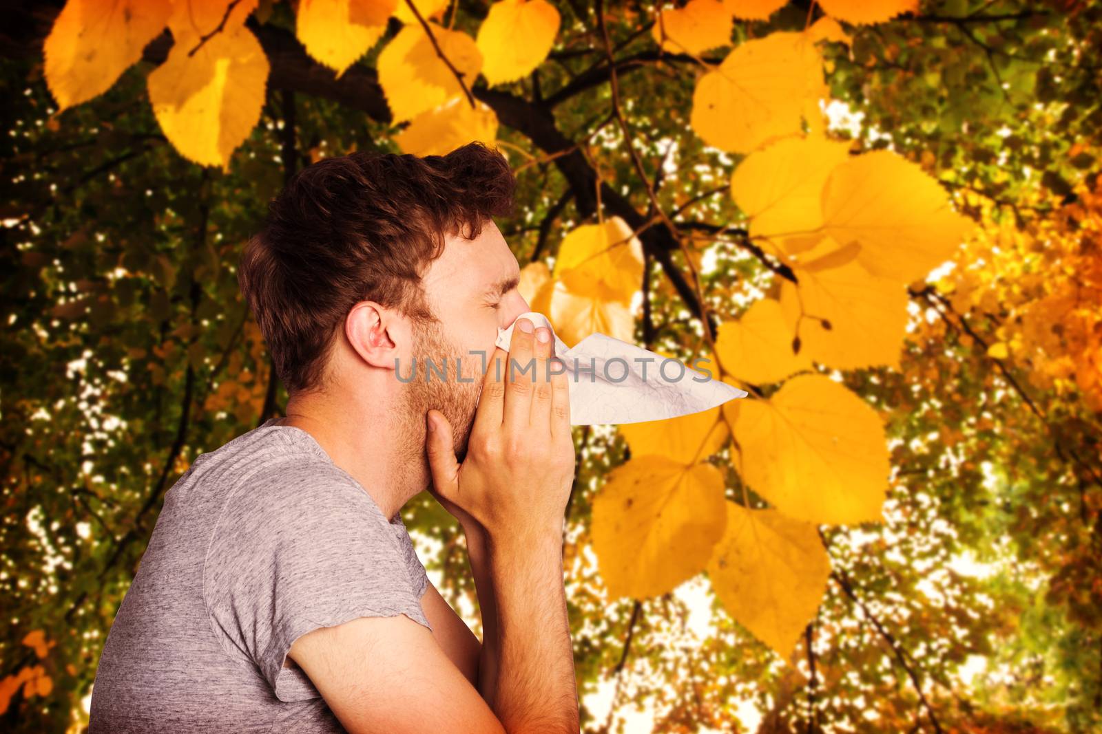 Composite image of close up side view of man blowing nose by Wavebreakmedia