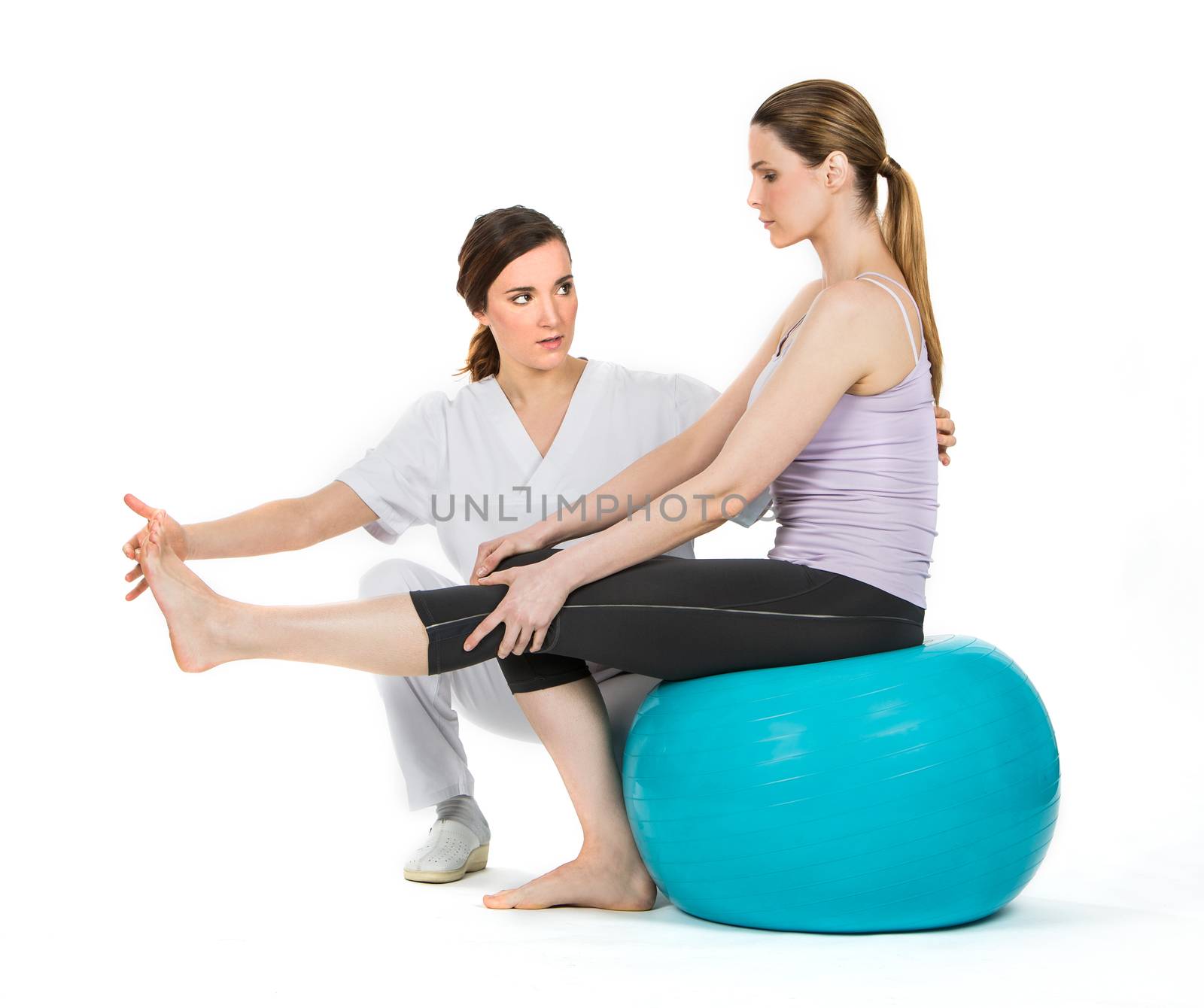 doctor with medical ball and woman patient