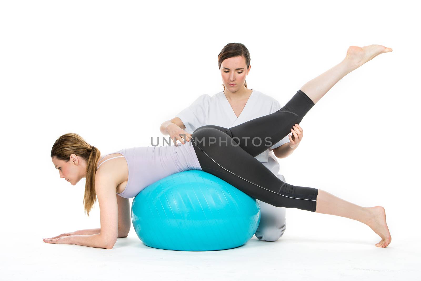 doctor with medical ball and woman patient