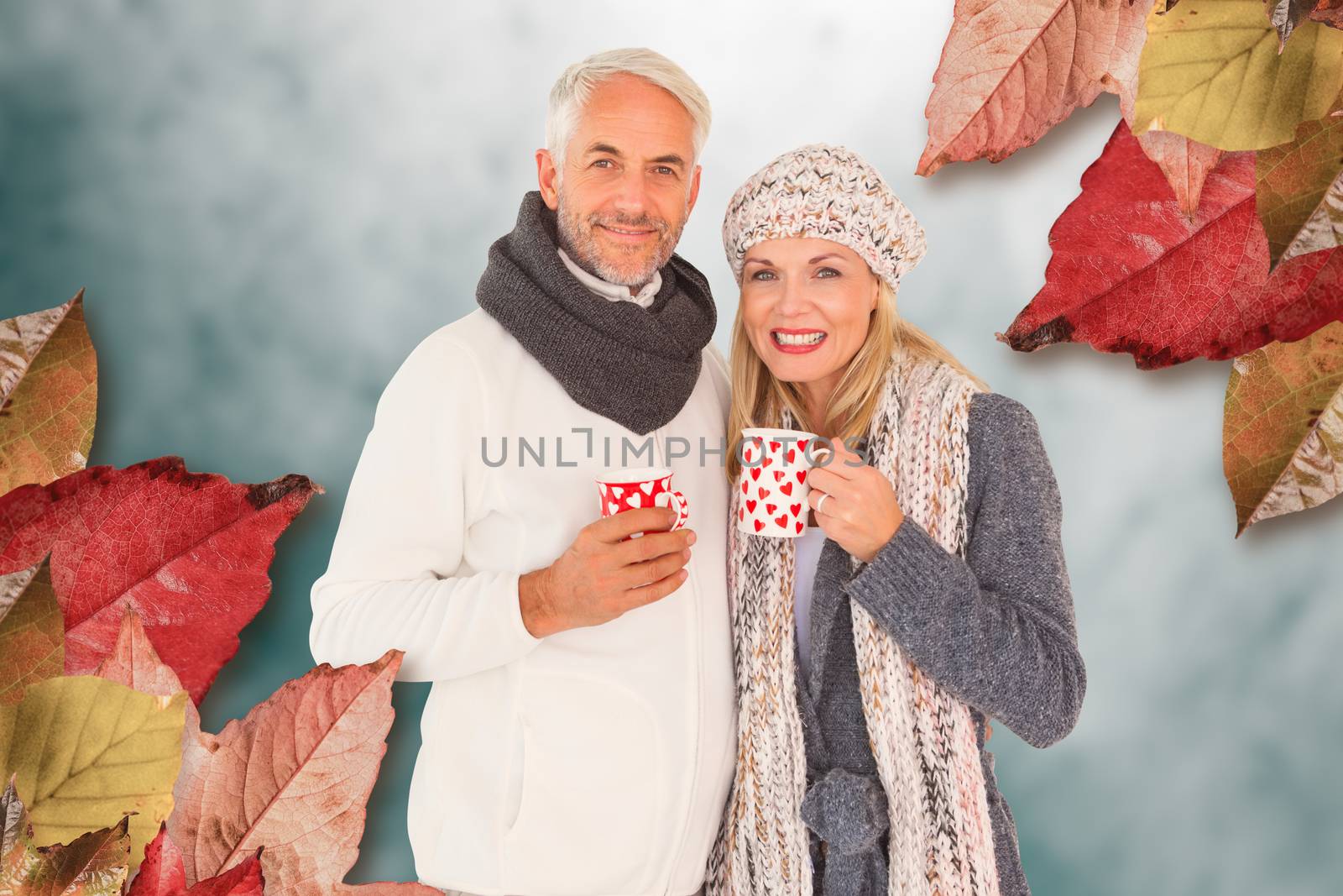 Composite image of portrait of happy couple drinking hot coffee by Wavebreakmedia