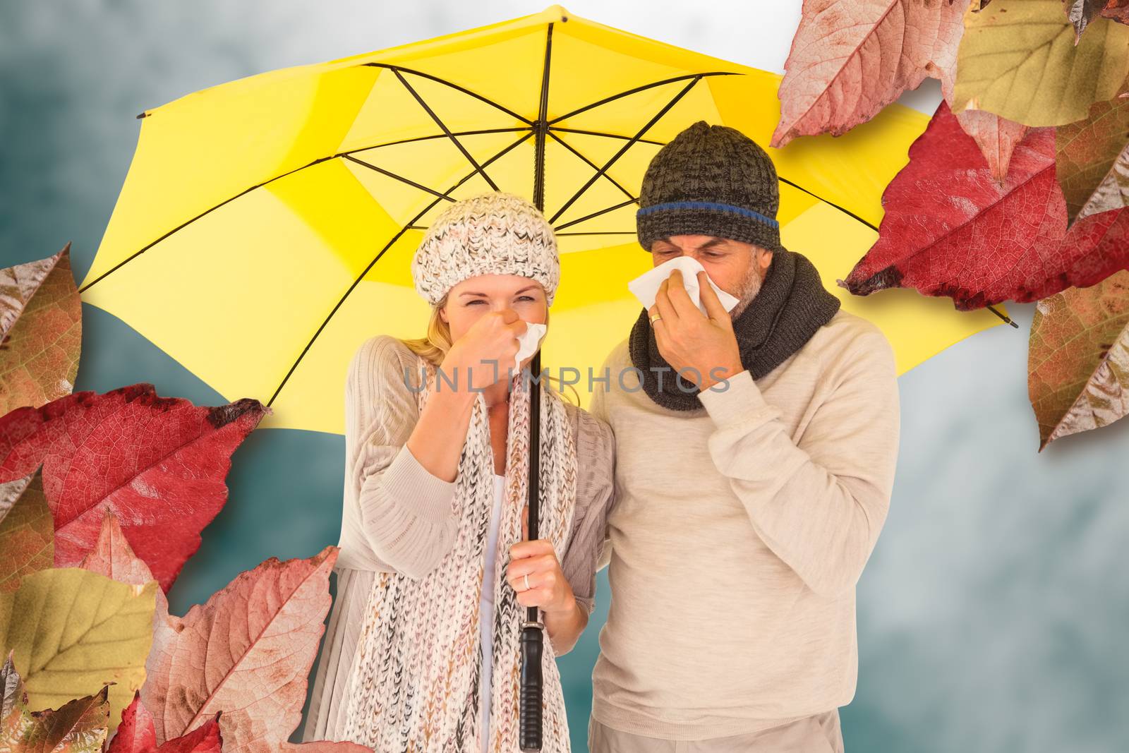 Couple sneezing in tissue while standing under umbrella against low angle view of sky