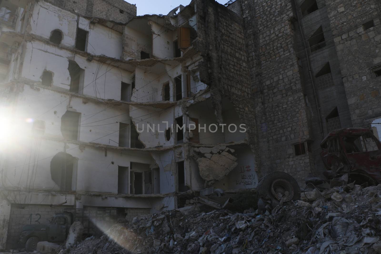 SYRIA, Aleppo: A glimpse into Aleppo, Syria on September 2, 2015, reveals a city destroyed by violence and war.  Little remains of the once populous city, on UNESCO's World Heritage list. Homes, businesses, and basic infrastructure have been severely damaged by years of civil war. The dangerous and unstable conditions are fueling a mass exodus of refugees from Syria into Europe.  The city of Aleppo also serves as an ISIS stronghold. 