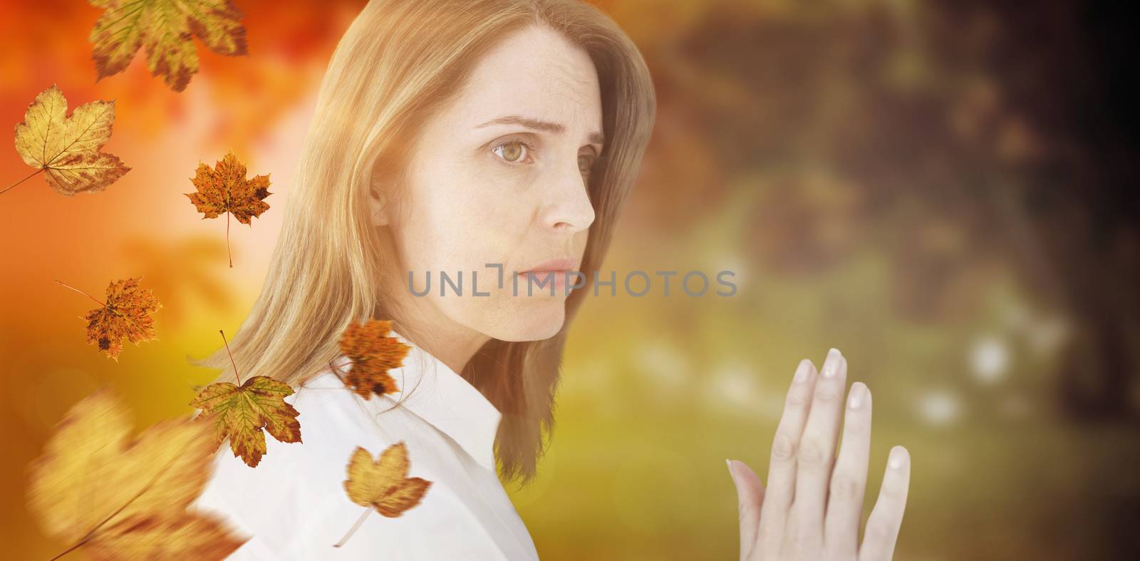 Composite image of depressed businesswoman looking away by Wavebreakmedia