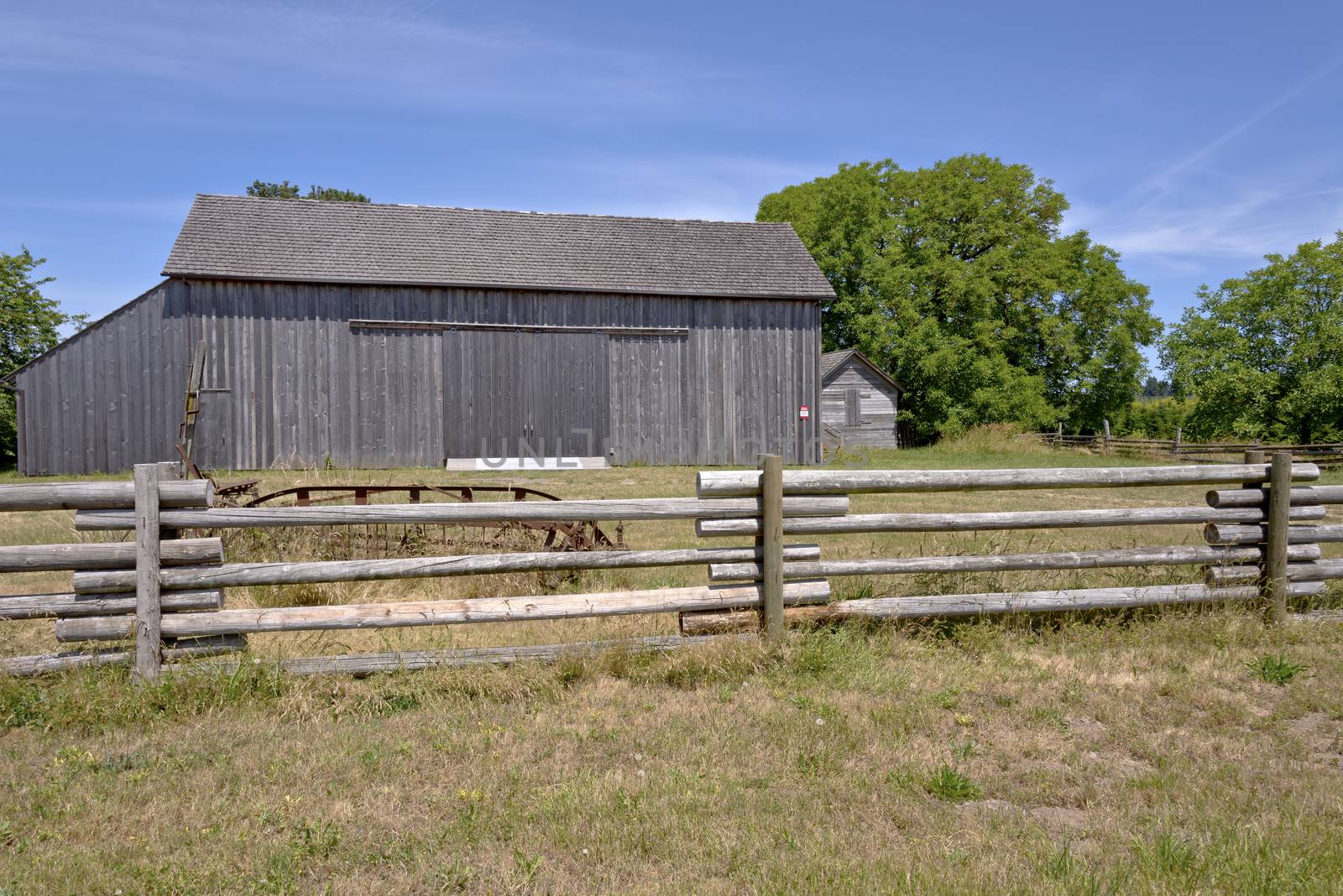 Old country barn and fence Oregon. by Rigucci