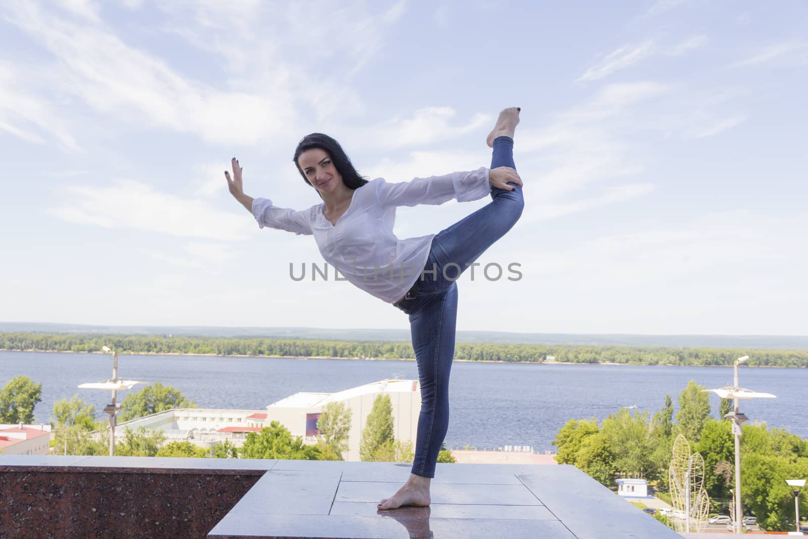 Photo of young woman on river background
